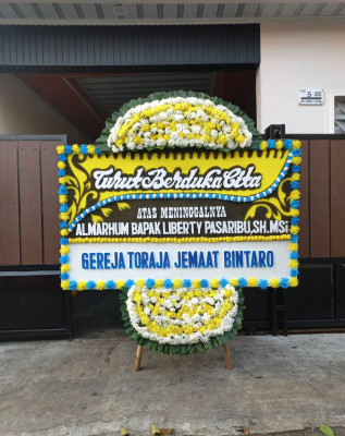 Papan Bunga Duka di Susunan Baru